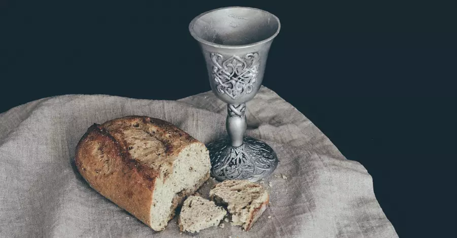 communion bread and wine cup on a table