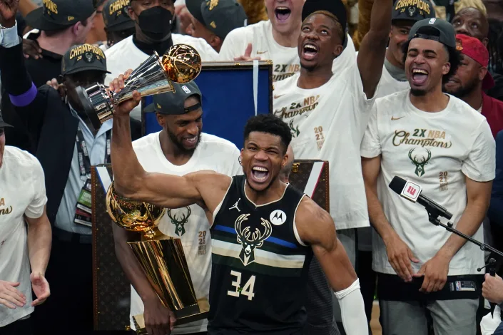 Milwaukee Bucks forward Giannis Antetokounmpo celebrating the NBA finals victory