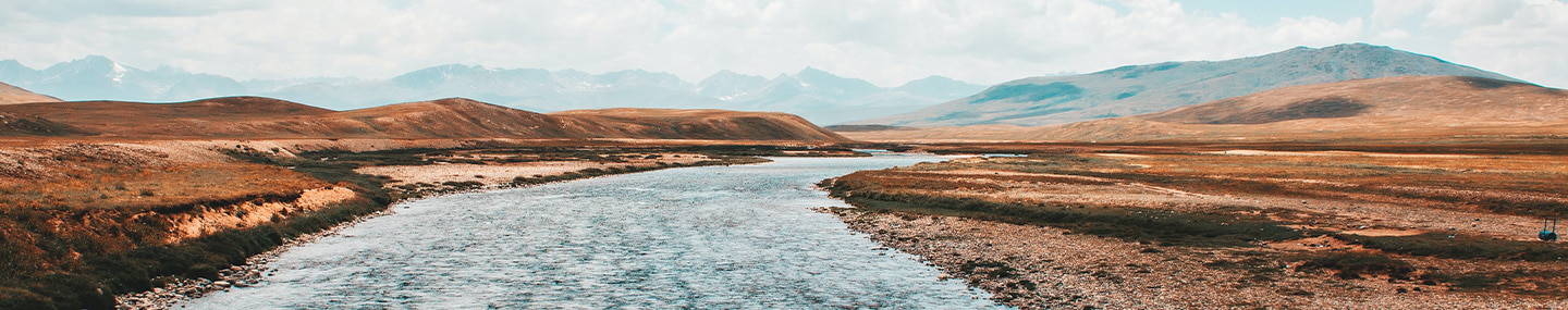 water flowing between hills